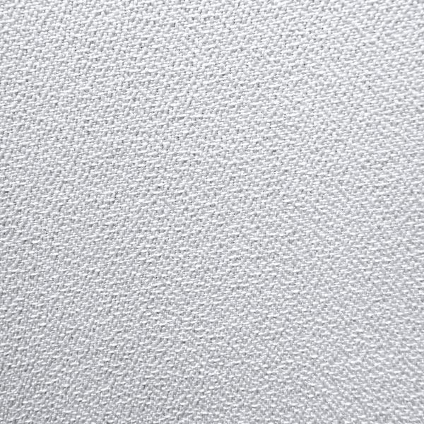 Närbild av den ljudgenomsläppliga specialcanvasens väv
